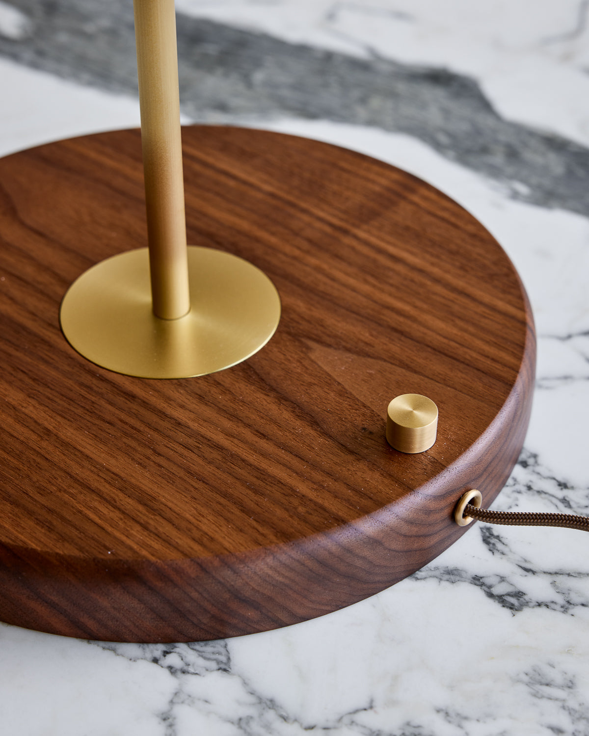 Brass table lamp with walnut base and blue leather shade