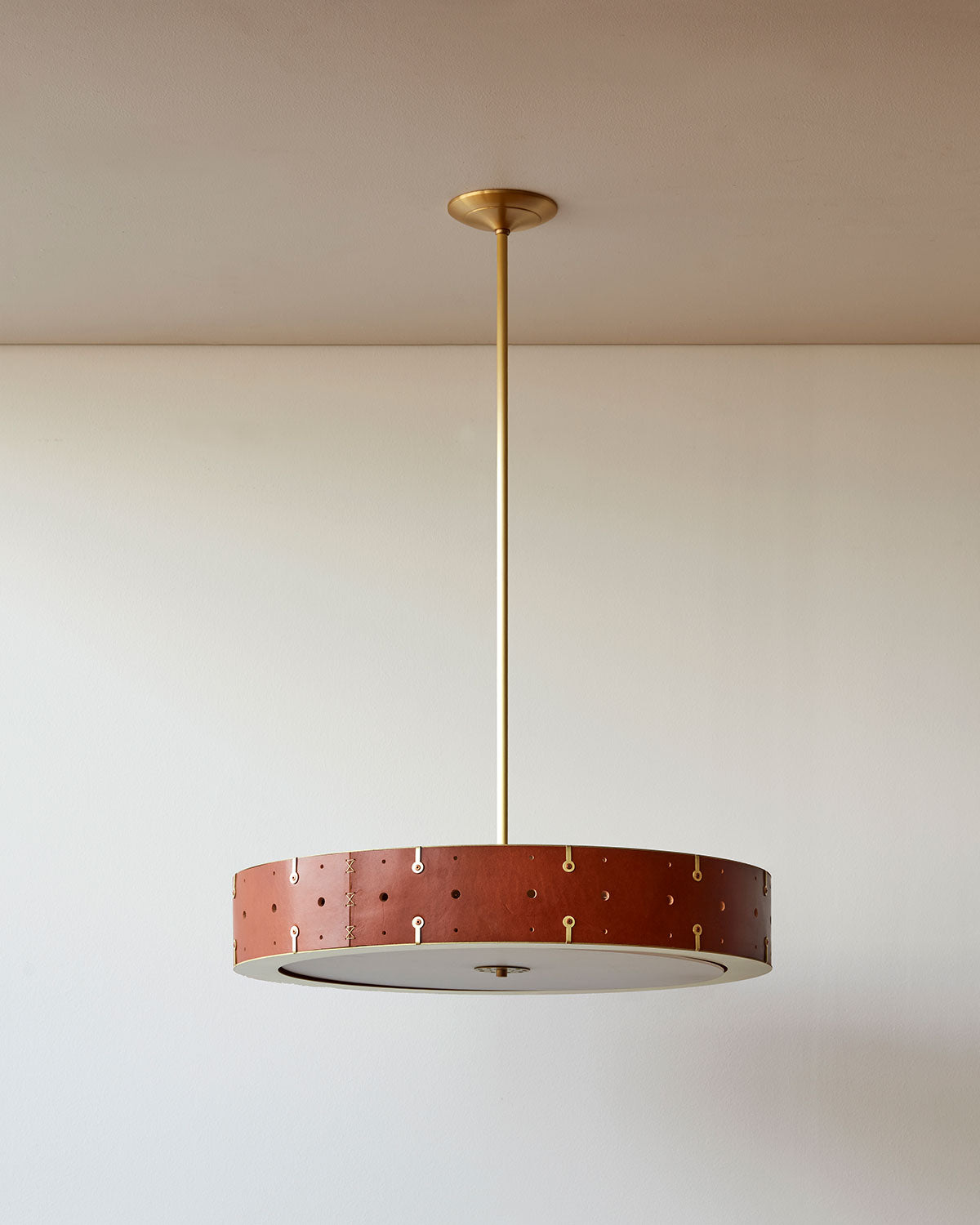 Beautiful satin brass ceiling pendant fixture with handstitched leather drum shade and customizable drop