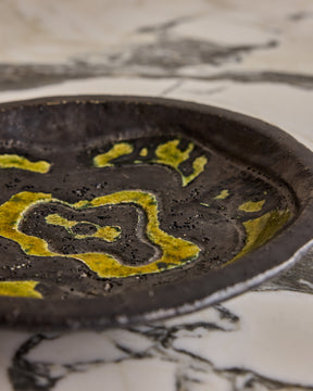 Black Ceramic Plate with Yellow Glaze