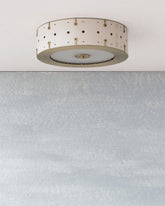 Beautiful satin brass flush mount ceiling fixture with handstitched leather drum shade