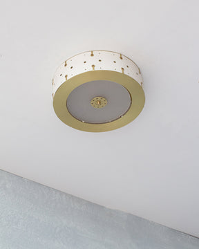Beautiful satin brass flush mount ceiling fixture with handstitched leather drum shade