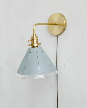 Classic satin brass plug in wall sconce with cone glass diffuser and decorative handstitched leather shade