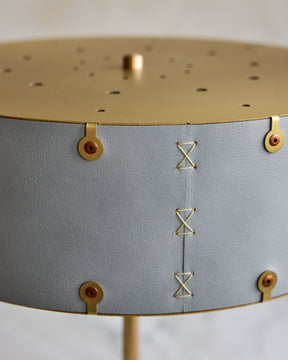 Brass table lamp with walnut base and blue leather shade