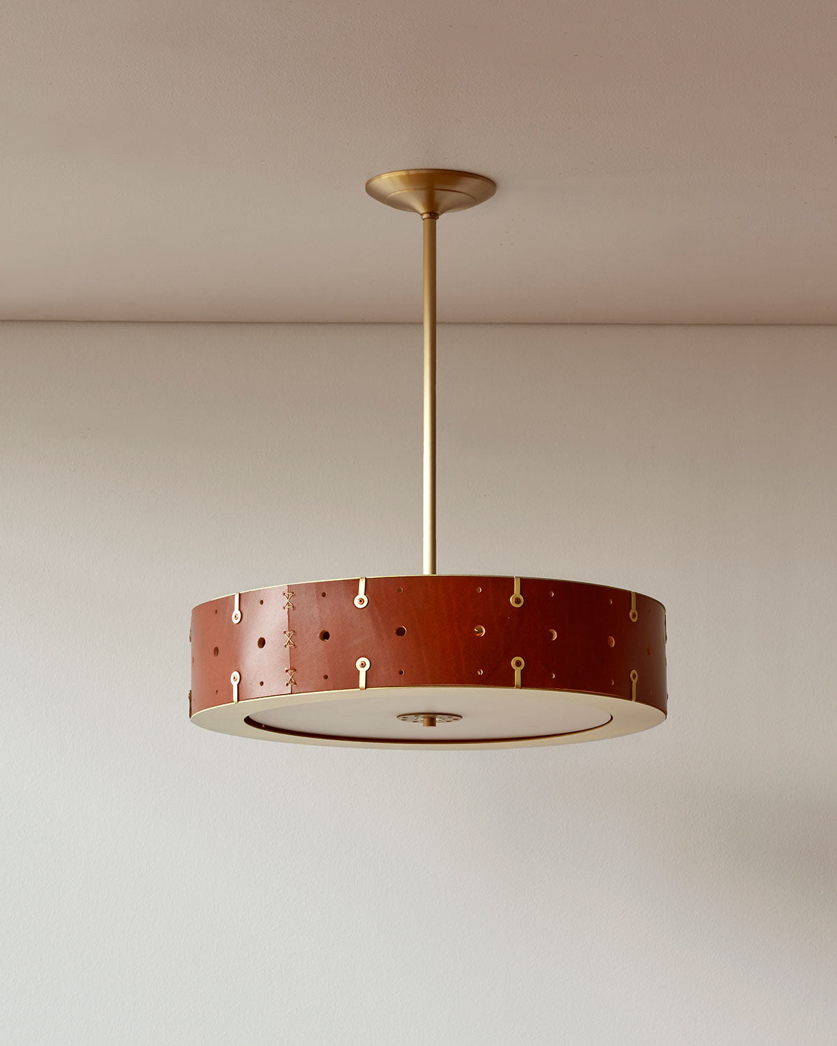 Beautiful satin brass ceiling pendant fixture with handstitched leather drum shade and customizable drop