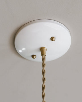 Classic cone pendant with hand-stitched decorative leather shade and glass diffuser